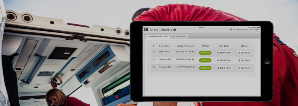 A Tablet Displaying an iOps360 Truck Check in the foreground, with an ambulance in the background