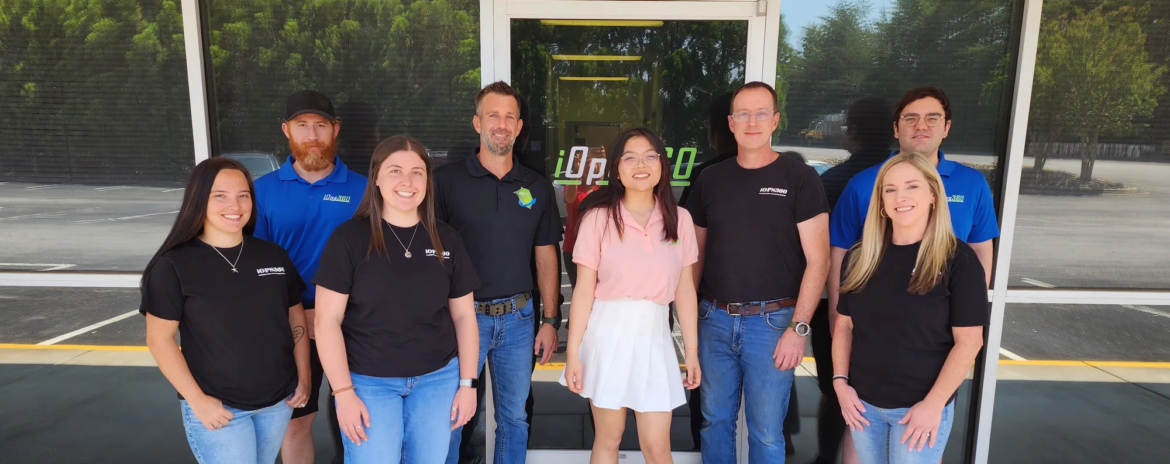 The Senior Team of iOps360 standing together in a group photo